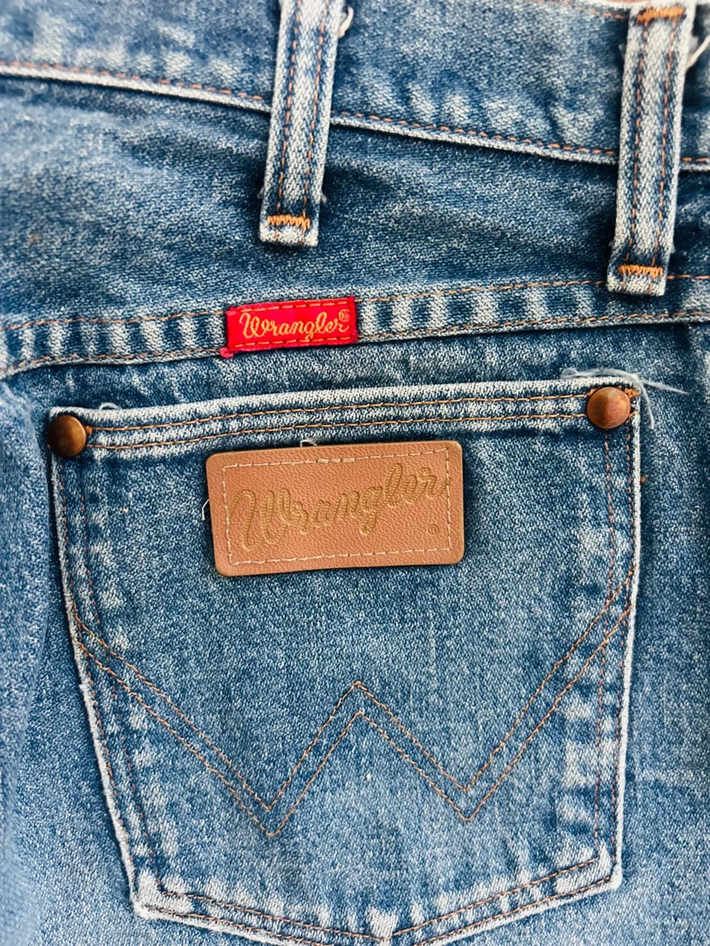 pair of vintage Wrangler high-rise cutoff denim shorts